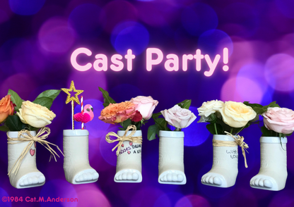 Cast party with the break a leg mug - flowers, beverages and novelties fill feet in casts for party.